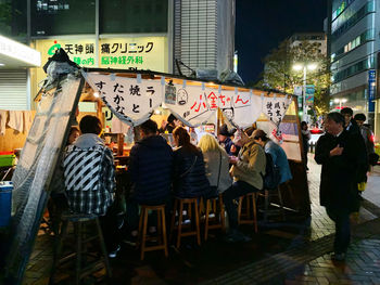 People on street in city