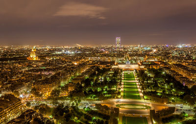 High angle view of illuminated buildings in city at night