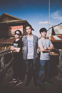 Portrait of boys standing outdoors