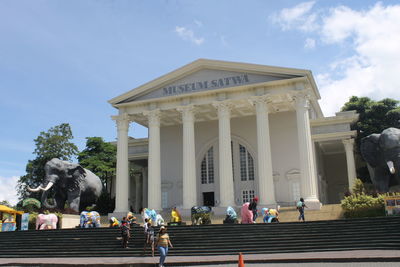 Group of people in front of building