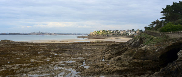 Scenic view of beach against sky