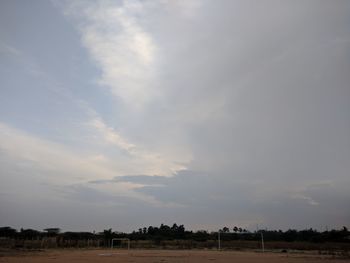 Scenic view of field against sky during sunset