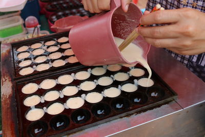 High angle view of person preparing food