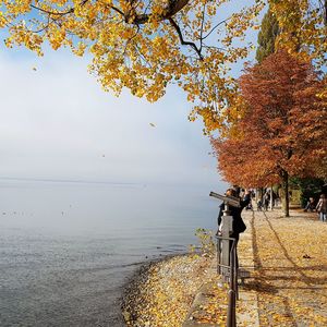 Scenic view of sea against sky during autumn