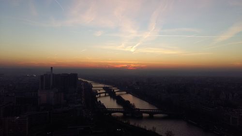 High angle view of city during sunset