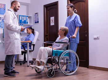 Portrait of female doctor working in office