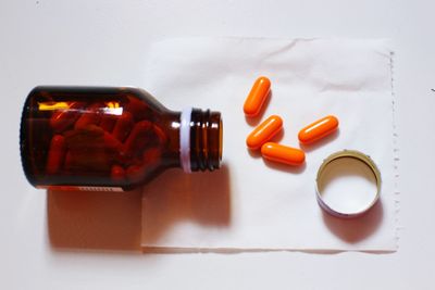 High angle view of bottles on table