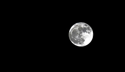 Low angle view of moon in sky