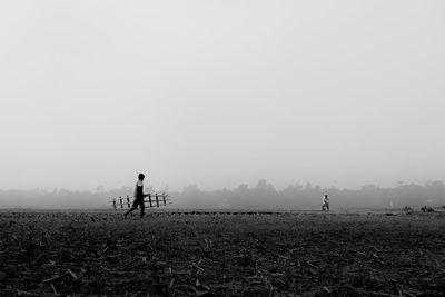 Child work in paddy field 