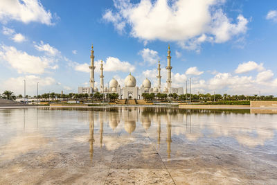 View of sheikh zayed mosque against cloudy sky
