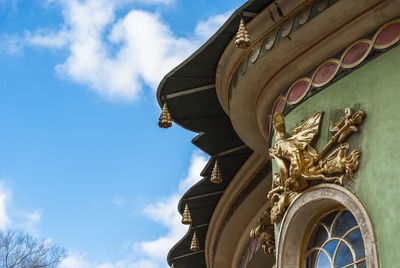 Low angle view of statue against sky