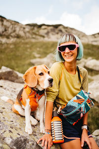 Portrait of young woman with dog