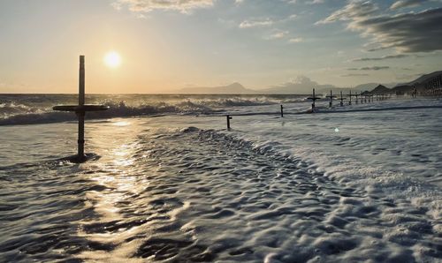 Scenic view of sea against sky during sunset