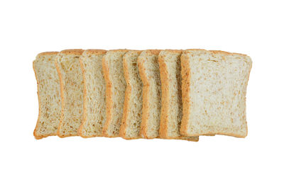 Close-up of bread against white background