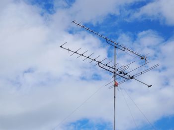 Low angle view of antenna against sky