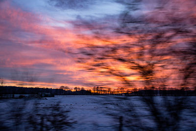 Scenic view of dramatic sky during sunset