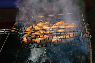 Close-up of food on barbecue grill