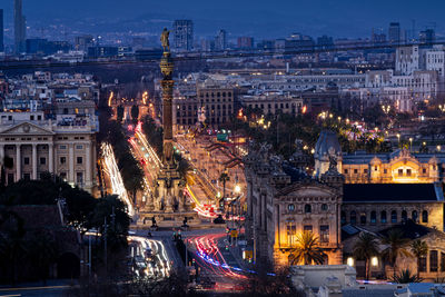 High angle view of city buildings at night