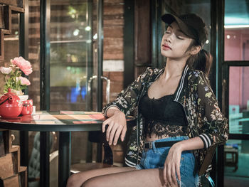 Portrait of woman sitting in cafe