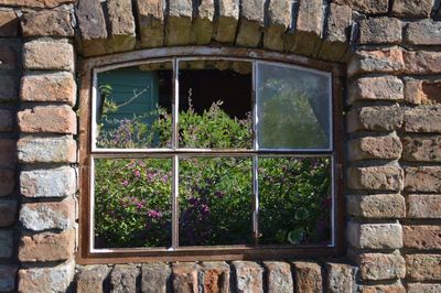 View of window on stone wall