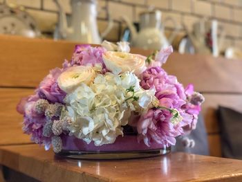 Close-up of pink flowers on table