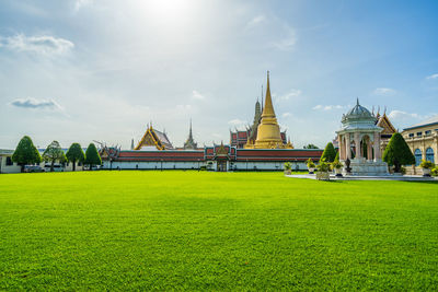 View of temple against building