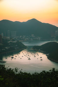 Scenic view of mountains against sunrise sky