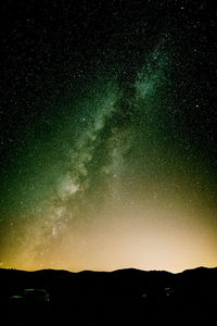Scenic view of star field against sky at night