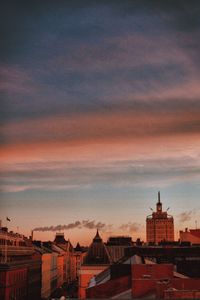 Cityscape against sky during sunset