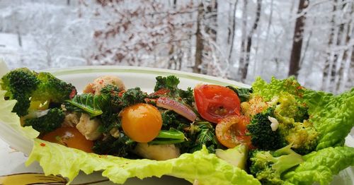 Close-up of fruits in plate on table