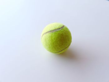 Close-up of apple ball on white background