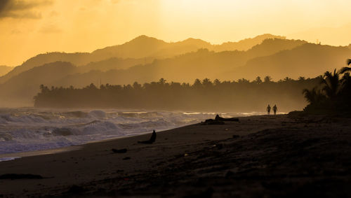 Scenic view of sunset over sea