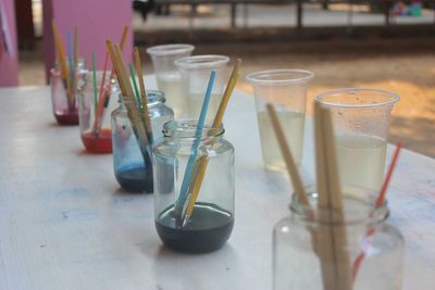 Close-up of glasses on table