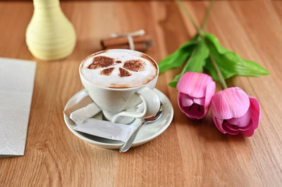 Close-up of cappuccino on table