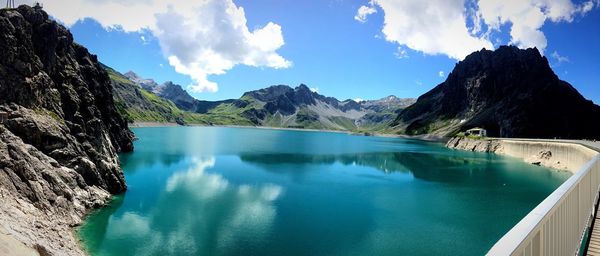 Panoramic view of lake against cloudy sky