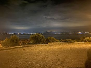 Scenic view of sea against sky at night