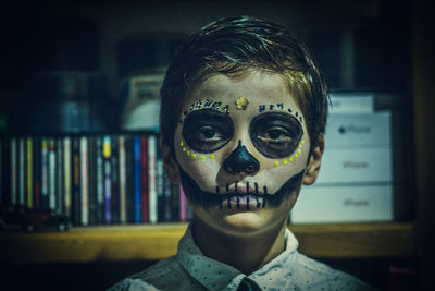 Portrait of man wearing mask at home