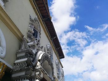 Low angle view of statue against sky