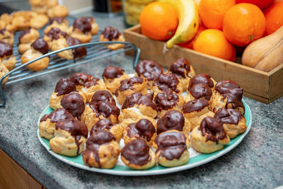 Close-up of fruits in plate on table