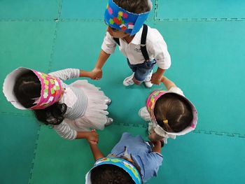 High angle view of people and daughter