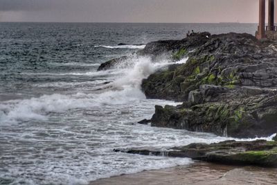 Waves splashing on rocks