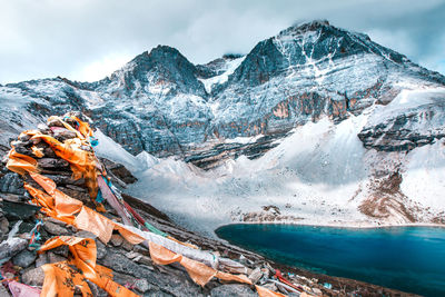 Scenic view of snowcapped mountains against sky