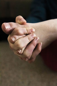 Close-up of hand holding hands