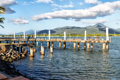 Pier over sea against sky