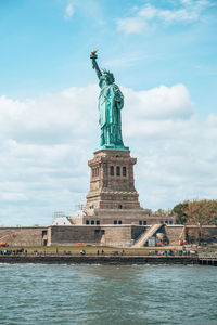 Low angle view of statue against sky