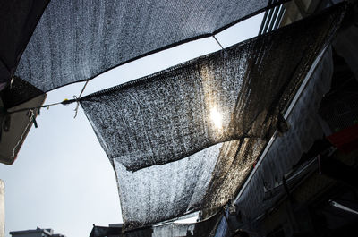 Low angle view of built structures against sky