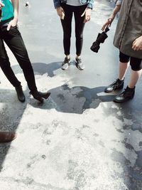 Low section of people standing in water