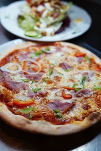 Close-up of pizza served in plate