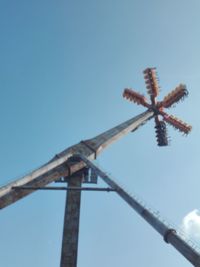 Low angle view of metallic structure against clear blue sky