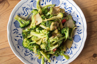 High angle view of chopped vegetables in plate on table